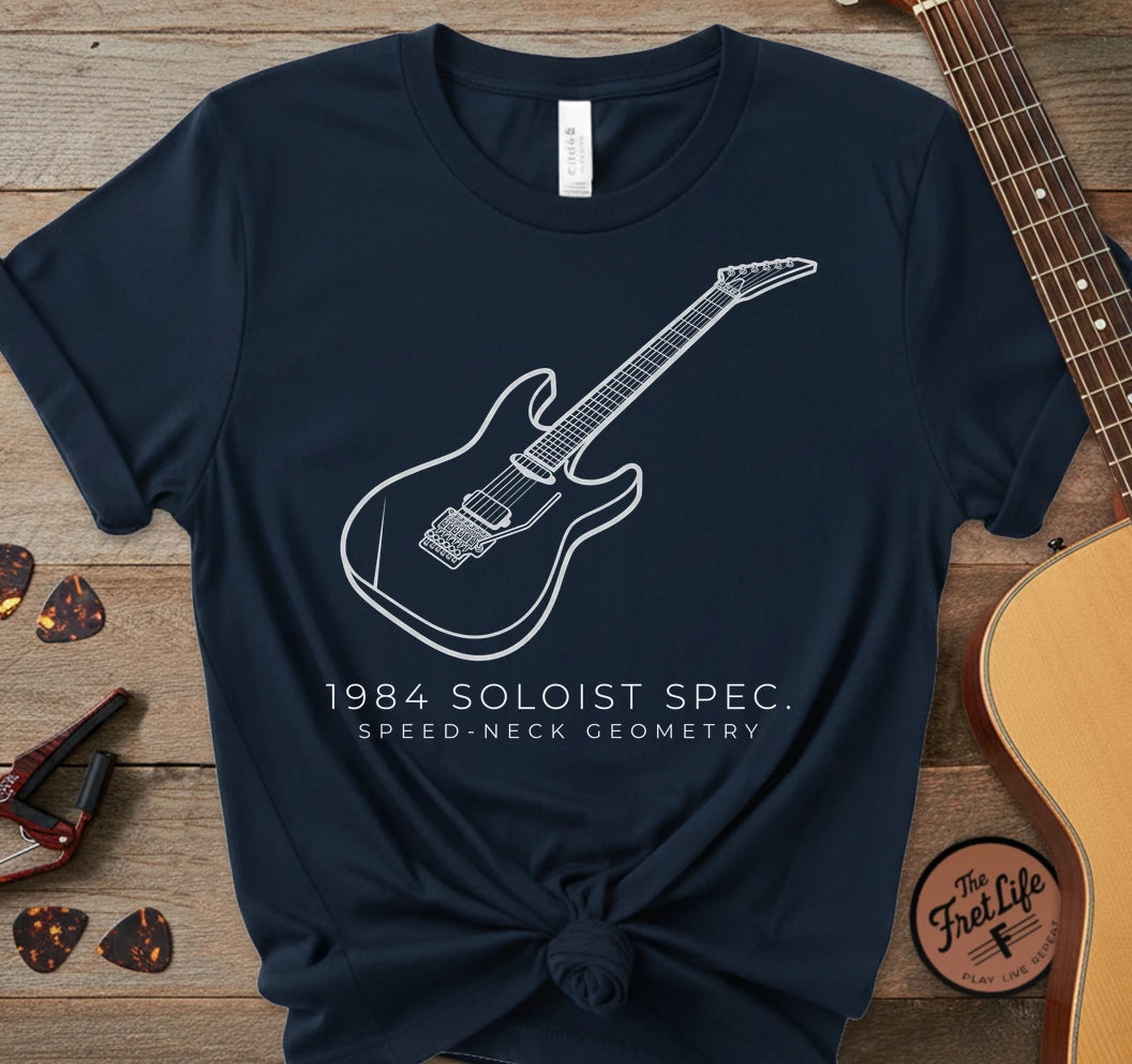 https://wescale-cdn.com/generated-mockups/06643e60-6f9f-4676-8a50-5fdfdc8f17c0/3a9605ae-e815-4cfe-83f8-b635bd7419a0/9df8555b-60e8-4f47-b165-76740c0d01cb_designs/1984_soloist_white_1774975471507_5bmzm8.png_1774975471797.webp