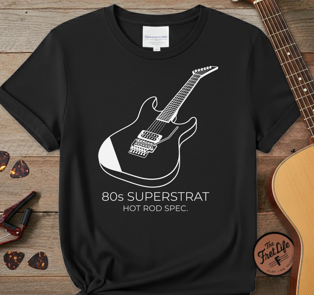 https://wescale-cdn.com/generated-mockups/06643e60-6f9f-4676-8a50-5fdfdc8f17c0/3a9605ae-e815-4cfe-83f8-b635bd7419a0/8e37a2a1-adb2-43d4-96a2-abaa995d1c4b_designs/80s_superstrat_white_1774975403469_f17ft8.png_1774975404223.webp