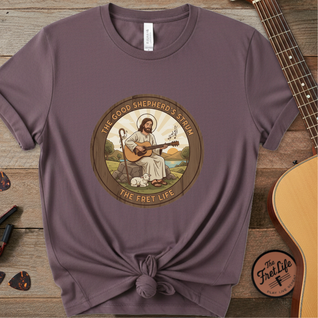 The Good Shepherd's Strum T-Shirt: Led by the Ultimate Musician.