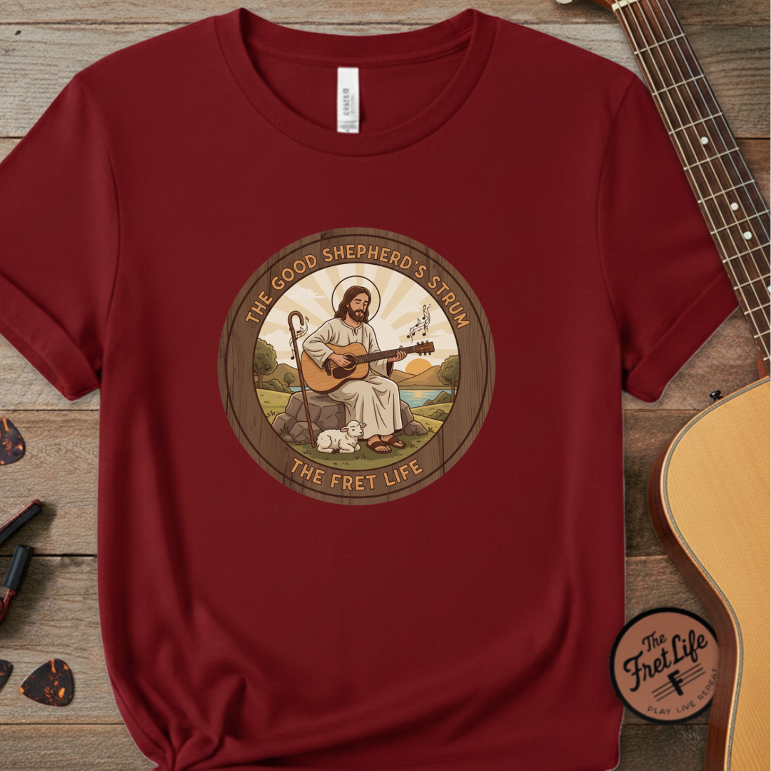 The Good Shepherd's Strum T-Shirt: Led by the Ultimate Musician.