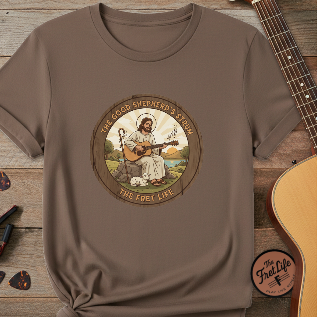 The Good Shepherd's Strum T-Shirt: Led by the Ultimate Musician.
