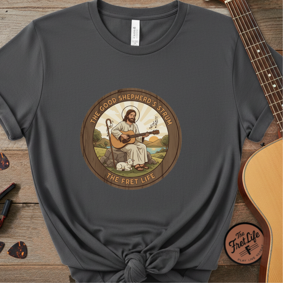 The Good Shepherd's Strum T-Shirt: Led by the Ultimate Musician.