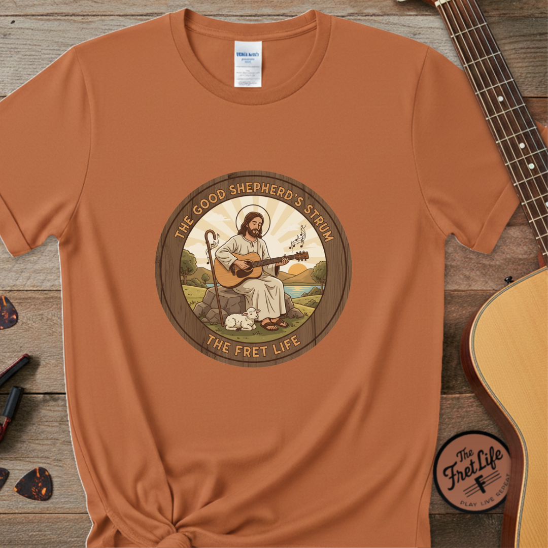 The Good Shepherd's Strum T-Shirt: Led by the Ultimate Musician.