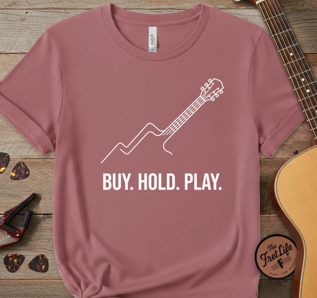 https://wescale-cdn.com/generated-mockups/06643e60-6f9f-4676-8a50-5fdfdc8f17c0/226c4cef-a7b3-4f93-9cb2-625a9c2411b5/bcf3ec2e-f6a0-47a5-b3e4-d6f65d421eb7_designs/buy_hold_play_white_1777479508824_g8tqyn.png.webp