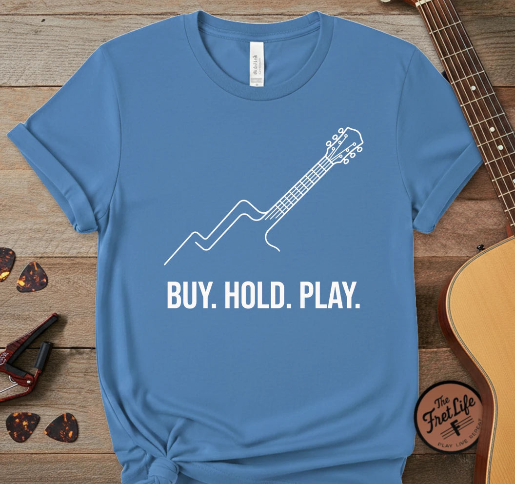 https://wescale-cdn.com/generated-mockups/06643e60-6f9f-4676-8a50-5fdfdc8f17c0/226c4cef-a7b3-4f93-9cb2-625a9c2411b5/8e6097f5-b301-4f0d-8a4e-f80583fc826b_designs/buy_hold_play_white_1777479508824_g8tqyn.png.webp