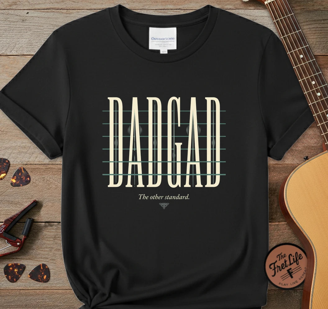 https://wescale-cdn.com/generated-mockups/06643e60-6f9f-4676-8a50-5fdfdc8f17c0/226c4cef-a7b3-4f93-9cb2-625a9c2411b5/bb30f8d0-6330-4208-89d9-1f20c2a2a25e_designs/dadgad_light_1777479016632_rv76k8.png.webp