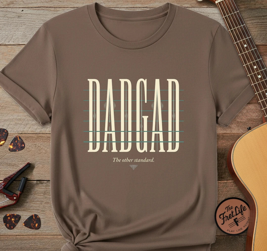 https://wescale-cdn.com/generated-mockups/06643e60-6f9f-4676-8a50-5fdfdc8f17c0/226c4cef-a7b3-4f93-9cb2-625a9c2411b5/1a6178eb-9525-4c97-8f5b-982608e4a573_designs/dadgad_light_1777479016632_rv76k8.png.webp