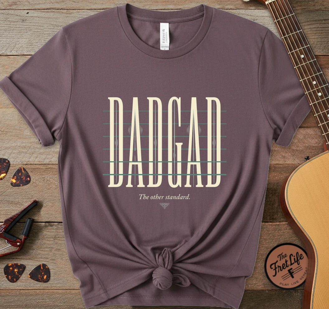 https://wescale-cdn.com/generated-mockups/06643e60-6f9f-4676-8a50-5fdfdc8f17c0/226c4cef-a7b3-4f93-9cb2-625a9c2411b5/30ff04ee-2323-444e-8f73-923ad71650d3_designs/dadgad_light_1777479016632_rv76k8.png.webp