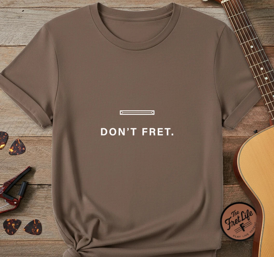 https://wescale-cdn.com/generated-mockups/06643e60-6f9f-4676-8a50-5fdfdc8f17c0/95c6ccee-668c-484f-a77b-49edc5ba2269/1a6178eb-9525-4c97-8f5b-982608e4a573_designs/don_t_fret_white_1775678199274_l0poxu.png.webp