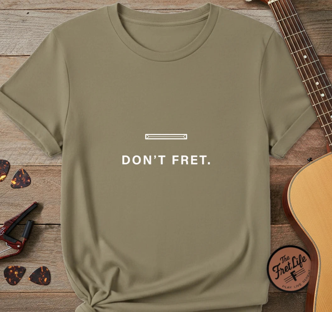 https://wescale-cdn.com/generated-mockups/06643e60-6f9f-4676-8a50-5fdfdc8f17c0/95c6ccee-668c-484f-a77b-49edc5ba2269/51942da4-ff3e-4c0e-8e91-f85c2c40375a_designs/don_t_fret_white_1775678211317_iu0bgi.png.webp