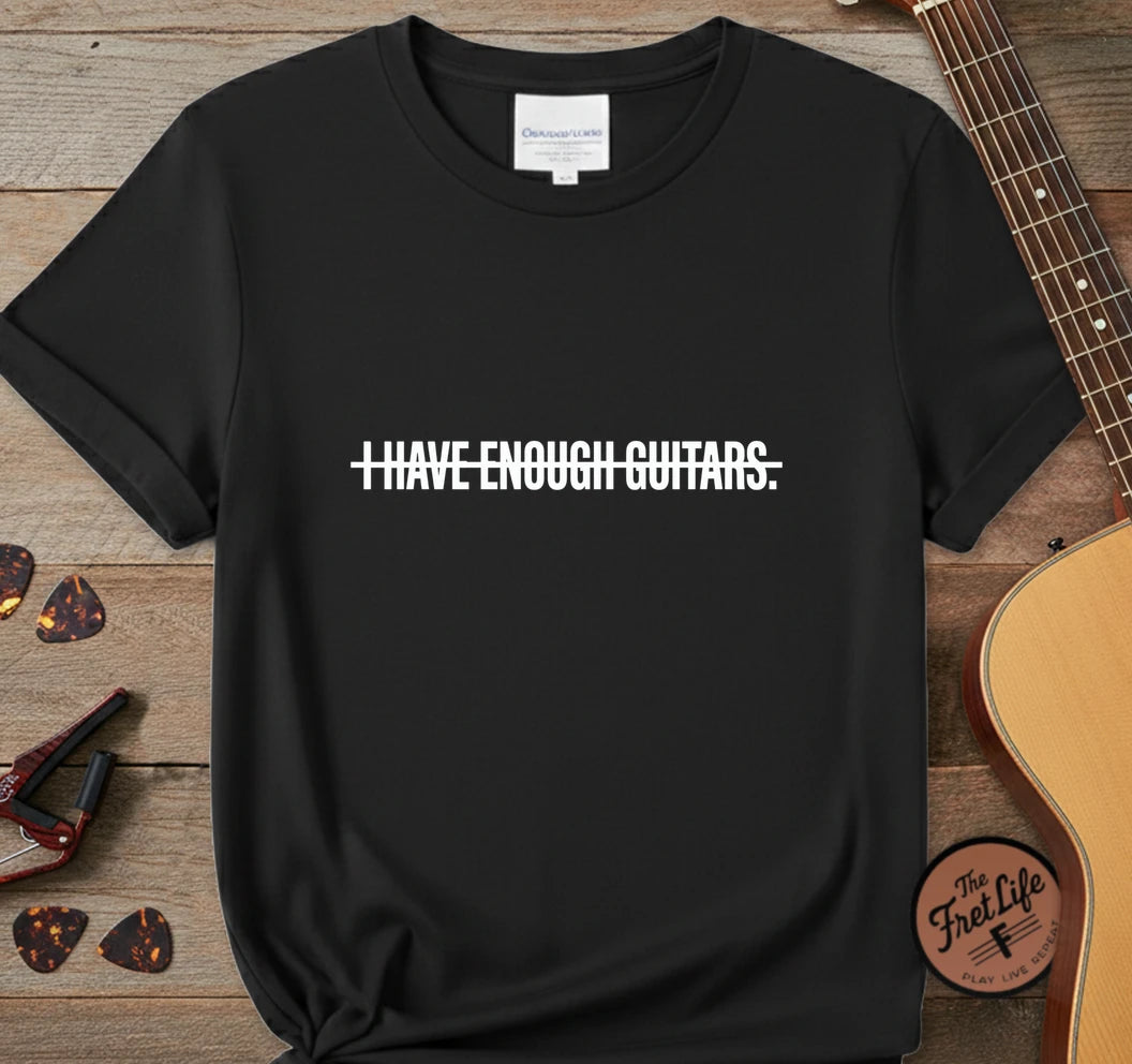 https://wescale-cdn.com/generated-mockups/743ebdcc-3fc9-40e2-b9d5-dd757f1a24dd/ecd01f76-a5aa-4437-88a6-1b7784d9e0c8/d1c62b19-cb19-450d-a0a8-50a43e348830_designs/enough_guitars_white_1776720199622_awtcrc.png.webp
