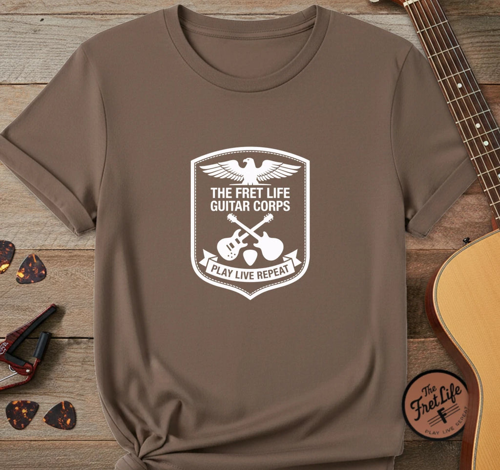 https://wescale-cdn.com/generated-mockups/06643e60-6f9f-4676-8a50-5fdfdc8f17c0/3d80ba1a-c3af-4032-aa70-62da15b1306f/1a6178eb-9525-4c97-8f5b-982608e4a573_designs/guitar_corps_white_1776951845927_z5fz09.png.webp