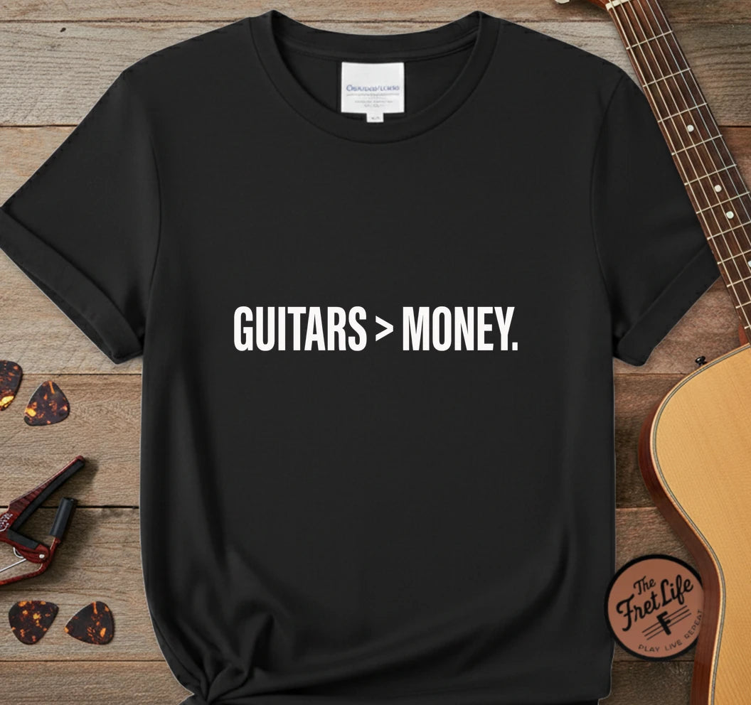 https://wescale-cdn.com/generated-mockups/743ebdcc-3fc9-40e2-b9d5-dd757f1a24dd/334a8ed6-304d-4046-8a95-21ba10cae732/d1c62b19-cb19-450d-a0a8-50a43e348830_designs/guitars_money_white_1776715770906_j4r299.png.webp