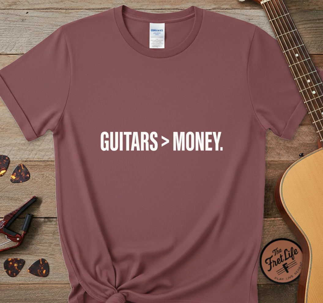 https://wescale-cdn.com/generated-mockups/743ebdcc-3fc9-40e2-b9d5-dd757f1a24dd/334a8ed6-304d-4046-8a95-21ba10cae732/114c4676-fa03-4016-98c5-dd4497ed6e4a_designs/guitars_money_white_1776715770906_j4r299.png.webp