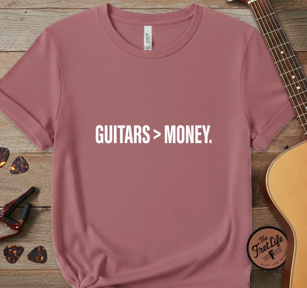 https://wescale-cdn.com/generated-mockups/743ebdcc-3fc9-40e2-b9d5-dd757f1a24dd/334a8ed6-304d-4046-8a95-21ba10cae732/f881f874-08a9-4e30-915e-22f2763cc809_designs/guitars_money_white_1776715770906_j4r299.png.webp