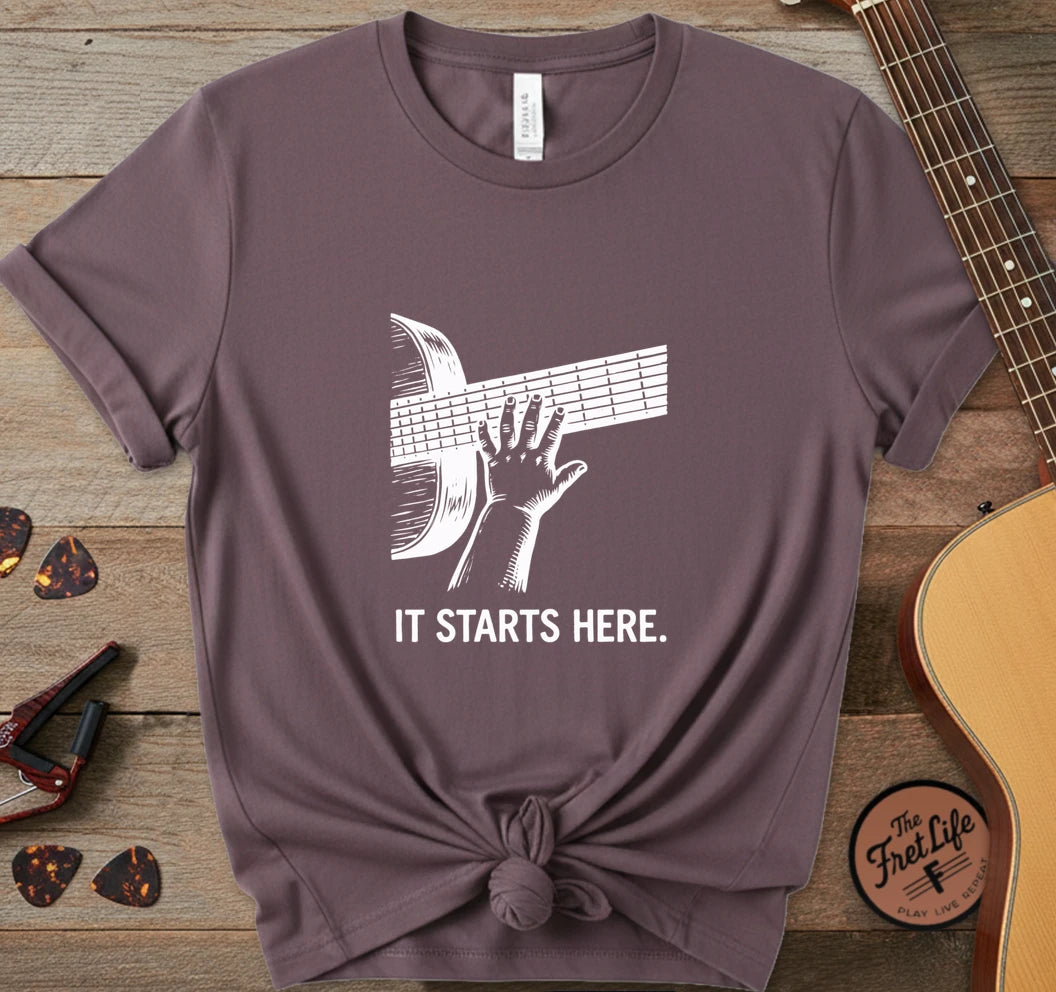 https://wescale-cdn.com/generated-mockups/06643e60-6f9f-4676-8a50-5fdfdc8f17c0/3d80ba1a-c3af-4032-aa70-62da15b1306f/30ff04ee-2323-444e-8f73-923ad71650d3_designs/it_starts_here_white_1776951180908_r7yhul.png.webp