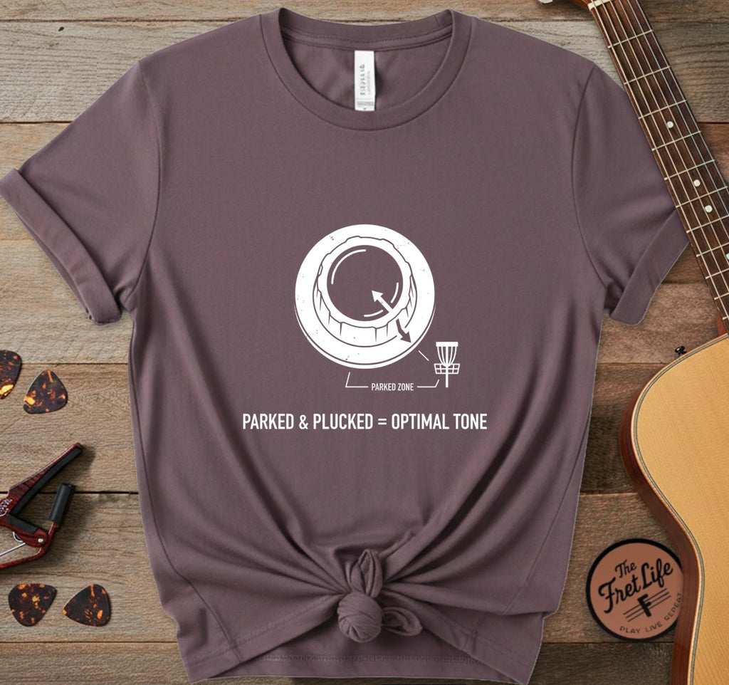 https://wescale-cdn.com/generated-mockups/06643e60-6f9f-4676-8a50-5fdfdc8f17c0/a4f72d4f-2a67-4c80-91ec-b9f2966b41b3/30ff04ee-2323-444e-8f73-923ad71650d3_designs/parked_plucked_white_1775523307320_bagl6g.png.webp