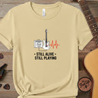 Printify T-Shirt Butter / S Still Alive, Still Playing | Premium T-Shirt