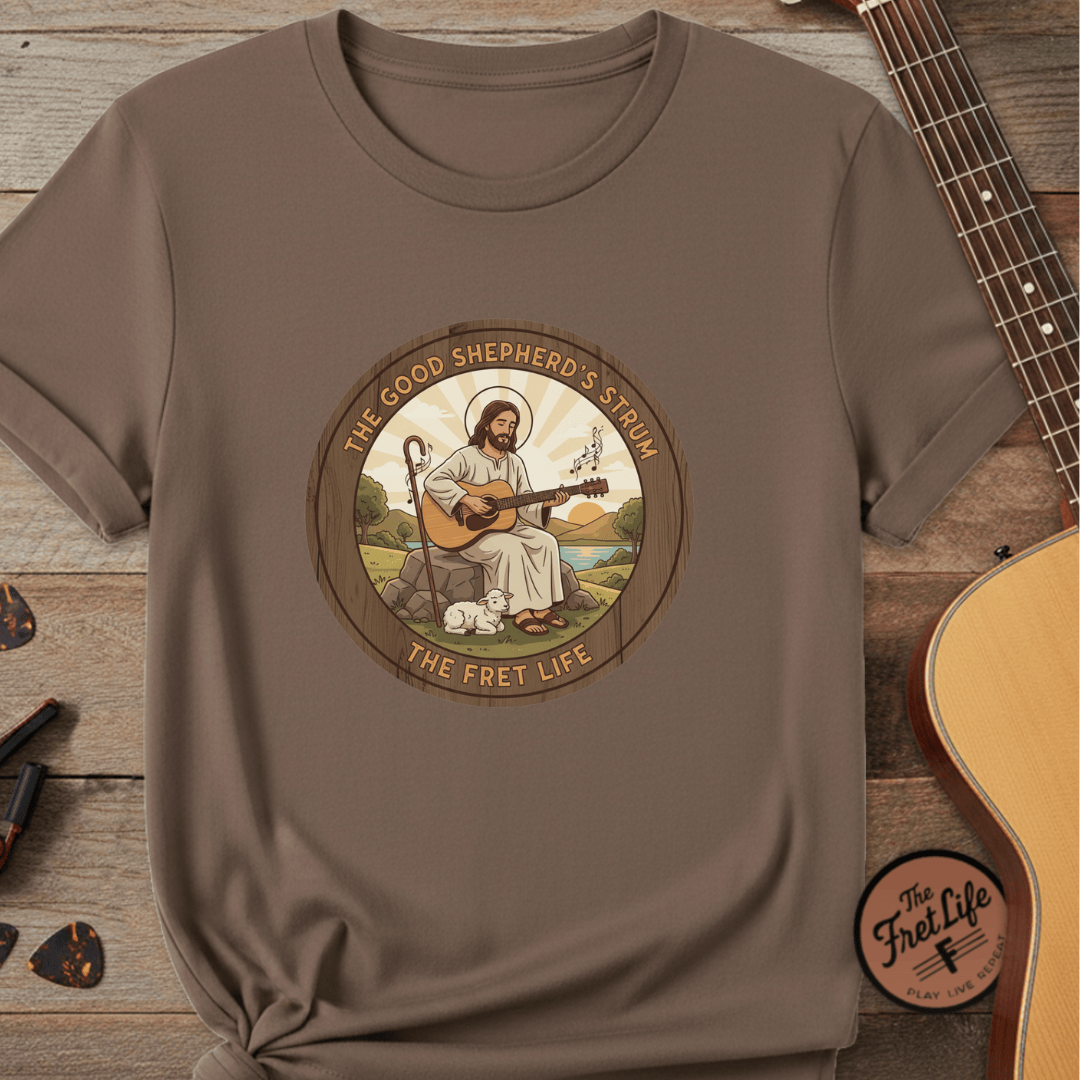 Printify T-Shirt Espresso / S The Good Shepherd's Strum T-Shirt: Led by the Ultimate Musician.