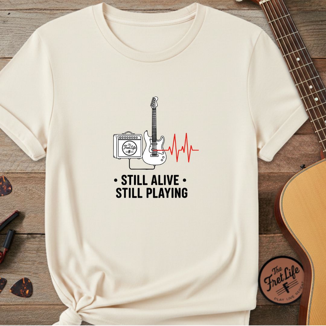 Printify T-Shirt Ivory / S Still Alive, Still Playing | Premium T-Shirt