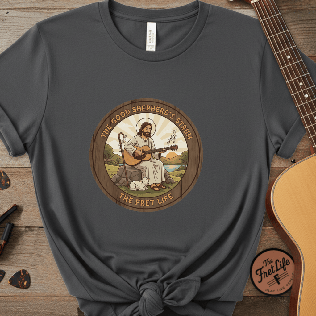 Printify T-Shirt Pepper / S The Good Shepherd's Strum T-Shirt: Led by the Ultimate Musician.