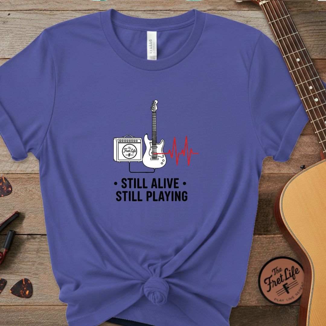 Printify T-Shirt Periwinkle / S Still Alive, Still Playing | Premium T-Shirt