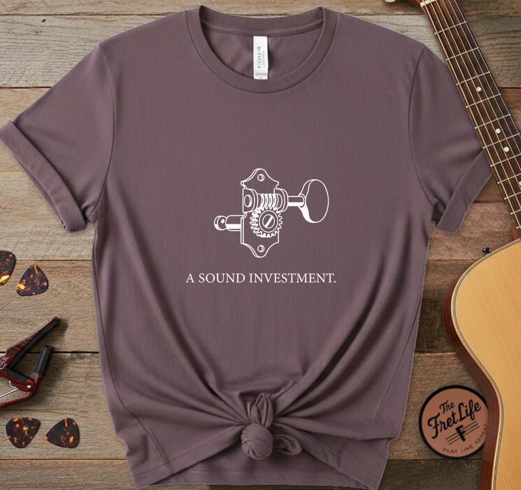 https://wescale-cdn.com/generated-mockups/06643e60-6f9f-4676-8a50-5fdfdc8f17c0/ce639f79-db02-452d-97aa-fbf1b69e53ec/30ff04ee-2323-444e-8f73-923ad71650d3_designs/sound_investment_white_1775681270575_fd42il.png.webp