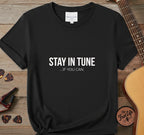 https://wescale-cdn.com/generated-mockups/06643e60-6f9f-4676-8a50-5fdfdc8f17c0/ce639f79-db02-452d-97aa-fbf1b69e53ec/bb30f8d0-6330-4208-89d9-1f20c2a2a25e_designs/stay_in_tune_white_1775681290778_wdjeob.png.webp