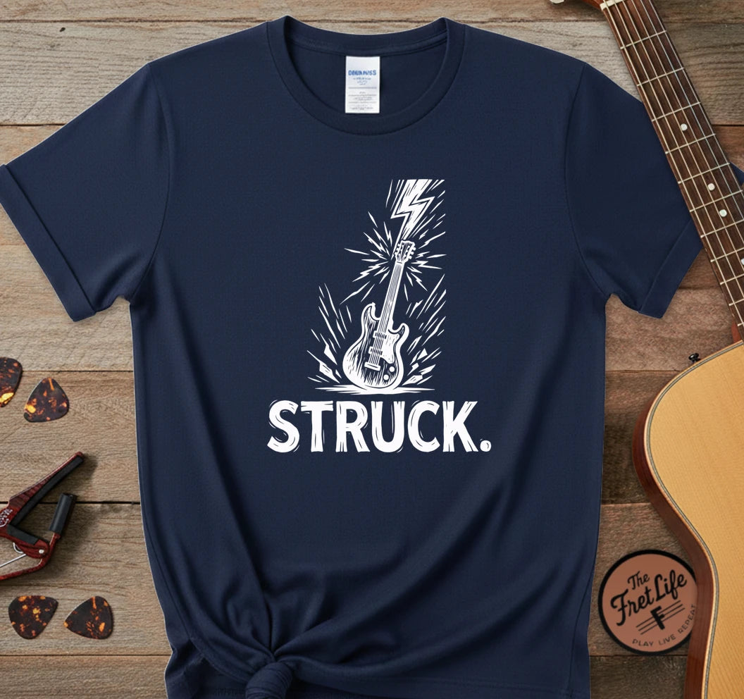 https://wescale-cdn.com/generated-mockups/06643e60-6f9f-4676-8a50-5fdfdc8f17c0/4a6a7a60-0d47-45f2-bc45-aac6c7233ed6/34024654-3103-4cc4-8105-1a361ac91aad_designs/struck_white_1776948297372_iuhrwq.png.webp