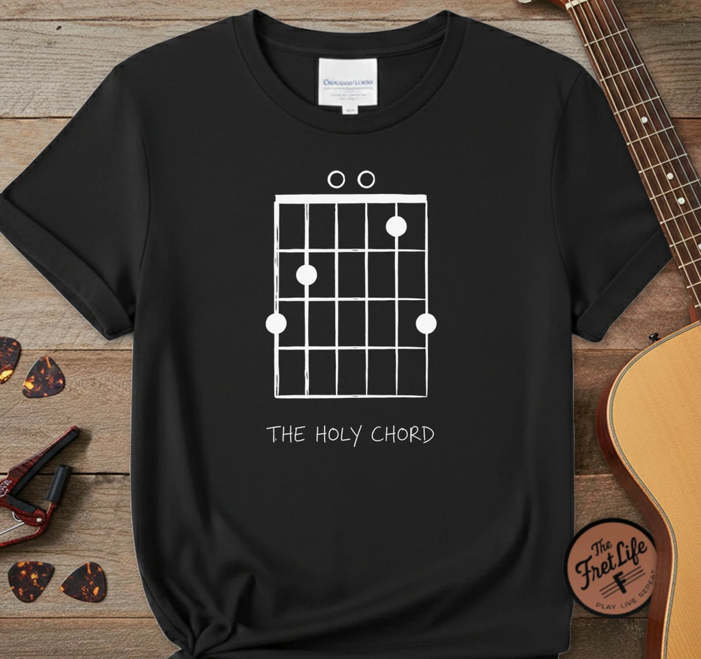 https://wescale-cdn.com/generated-mockups/06643e60-6f9f-4676-8a50-5fdfdc8f17c0/85608e0a-5b2c-45d4-adad-446d1b111d9e/8e37a2a1-adb2-43d4-96a2-abaa995d1c4b_designs/the_holy_chord_white_1775098417362_eb4yni.png_1775098417724.webp
